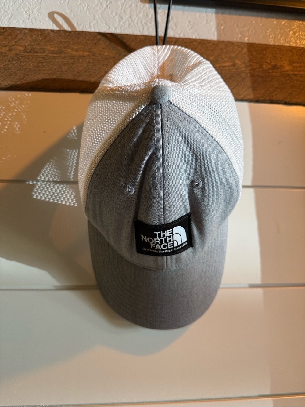 The North Face Gray and White Fitted Mesh Trucker Hat